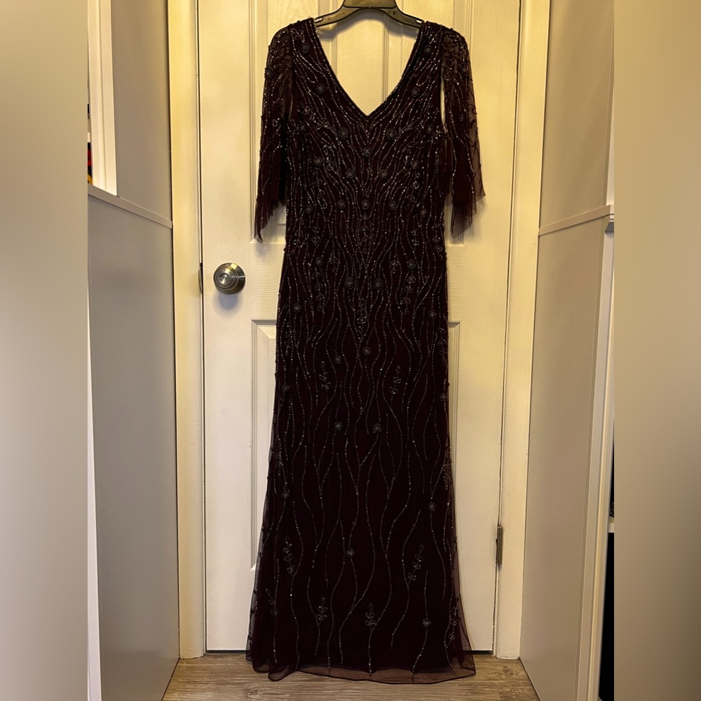 JKARA wine long beaded gown.